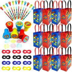 a bunch of party supplies including masks, bags and eye glasses for kids to play with