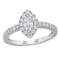 a pear shaped diamond engagement ring set in 18k white gold with diamonds around the band