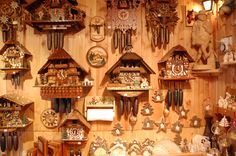 cuckoo clocks are on display in a shop