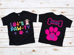 two children's t - shirts with paw prints and the words let's pawty on them