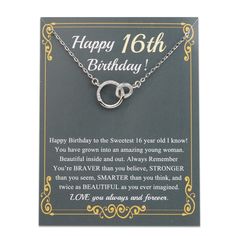 a birthday card with a silver necklace on it