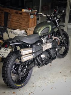 a motorcycle is parked in a garage