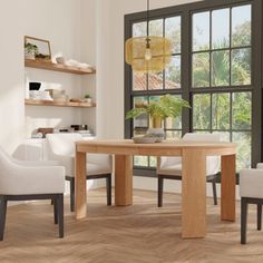 a dining room table with chairs around it