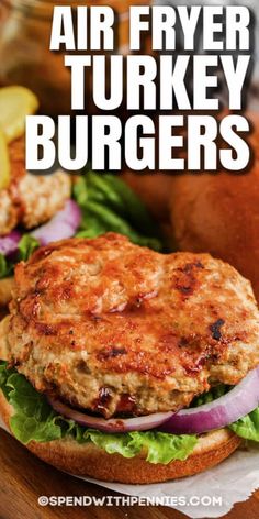 an air fryer turkey burger with lettuce and onions