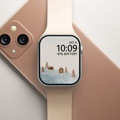 an apple watch with the time displayed on it's screen and two other devices next to it