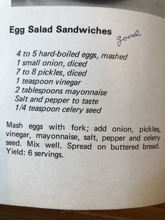 an egg salad sandwich is shown in the middle of a recipe book with instructions on how to make it