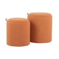 two orange round ottomans sitting next to each other