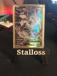 a close up of a nintendo wii game on a table with the name stalloss