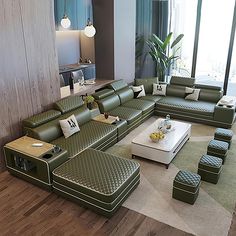 a living room filled with lots of green furniture