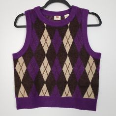 New With Tags Levi's Deja Vu Argyle Sweater Vest Classic Vintage Silhouette Of An Old School Sweater Vest, And Printed With An Old-School Argyle Pattern Crafted With Plush, Cozy Yarn, This Is One Vest That Will Never Go Out Of Style Size: Small Crewneck Sleeveless Color: Plum Purple / Chocolate Brown Pattern: Argyle "Super Cozy" Cute Lamb Patch On Back Of Vest 68% Acrylic, 29% Polyester, 3% Elastane Hand Wash Only, Lay Flat To Dry *Please See Photos For Approximate Measurements (In Inches) *Super Fast Shipping! We Will Ship Out By Next Business Day! *Smoke Free / Pet Friendly Home Vintage Purple Winter Tops, Retro Purple Winter Tops, Twilight Cosplay, Purple Chocolate, Sweater Vest Outfit, School Sweater, Cute Lamb, Argyle Sweater Vest, Spelling Bee