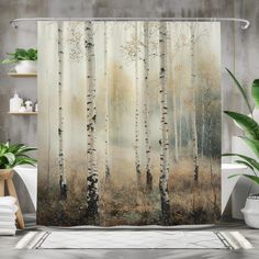 a shower curtain with an image of trees in the woods on it's side