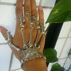 Halloween hand skeleton bracelet. Set of 2 Halloween is almost here. Get ur beautiful skeleton bracelet now. Only one available. Jewelry Bracelets Skeleton Accessories, Skeleton Body Jewelry, Skeleton Hand Accessory, Metal Skeleton Hand Bracelet, Skeleton Bracelet, Skeleton Jewelry, Edgy Skull-shaped Metal Bracelets, Skeleton Hands, Valentino Studs