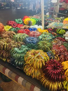 there are many different colored fireworks on the table