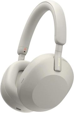 the sony headphones are white and have an orange button on each earpieces