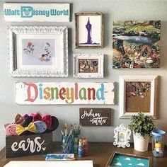 there are many disney world pictures on the wall