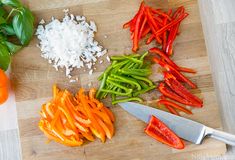 the vegetables are cut up and ready to be cooked on the cutting board for cooking