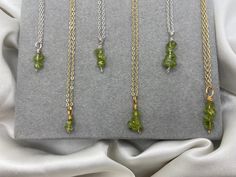 "Save when you shop through my website, I'd appreciate it 💚- https://shorturl.at/dGU49 ✨check out the rest of my crystal jewellery here - https://etsy.me/3nxyN99 ✨ Healing Crystal peridot dainty gold and silver necklaces, available in 2, 3 or 4 stone pendants 💘 Peridot protects against difficulties and negativity. It strengthens and purifies the physical and energetic bodies.  Peridot is full of joy & warmth, able to ease anger & jealousy whilst encouraging open-heartedness. It is a crystal of abundance and gratitude - helping you to welcome abundance in every form. Peridot is also super helpful for identifying damaging patterns, cycles & blocks, so that you may release them.  Peridot pushes you to trust your own inner guide & voice, becoming less attached to the input of others outside Peridot Pendant Necklaces For Jewelry Making, Faceted Pendant Necklace For May Birthstone, Gift Peridot Faceted Necklaces, Faceted Peridot Necklaces For Gift, Faceted Peridot Necklaces As Gift, Crystal Peridot, Dangly Necklace, Sagittarius Birthstone, Gold Silver Necklace