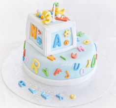 a cake that is decorated with letters and numbers