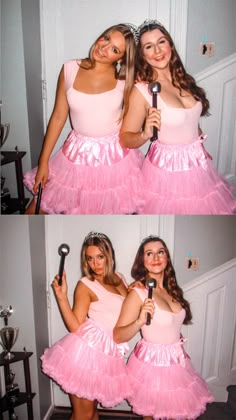 two women in pink dresses holding microphones and posing for the camera with their arms around each other