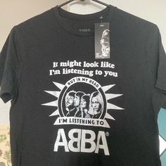 Awesome Official Merch From The Abba Museum In Sweden. "I Might Look Like I'm Listening To You But In My Head I'm Listening To Abba" With Photo Of The Band Abba Merch, Abba Tshirt, Abba Museum, In My Head, The Band, Listening To You, Abba, Sweden, Metallica