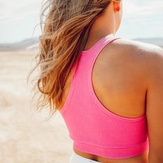 Are you looking for the perfect tank top that pairs effortlessly with all your summer favorites? Look no further than the Washed Hot Pink Ribbed Racerback Tank Top! Made with a premium lightweight and airy fabric, this tank features a classic ribbed design, v-neckline, and racerback style that create a timeless look.The Washed Hot Pink Ribbed Racerback Tank Top is the ultimate must-have for those hot summer days. Not only is the ribbed design incredibly flattering, but it’s also incredibly breat Summer Workout Ribbed Tops, Sporty Seamless Tank Top For Beach, Seamless Stretch Summer Tank Top, Trendy Racerback Sports Bra For Summer, Seamless Summer Sports Bra For Everyday, Seamless Sports Bra For Everyday Summer Wear, Spring Everyday Activewear Tank, Spring Tank-style Activewear, Everyday Spring Tank Activewear