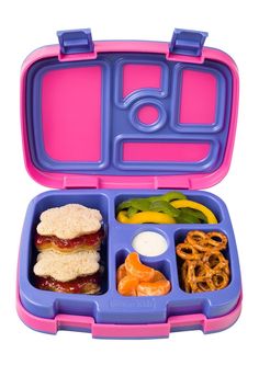 a lunch box with sandwiches and pretzels in it