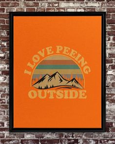 an orange poster hanging on a brick wall with the words i love peing outside