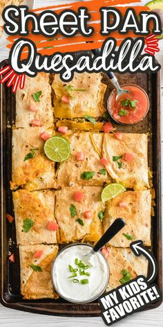 sheet pan quesadilla on a tray with salsa and sour cream in the middle