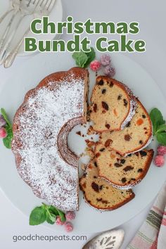 a christmas bundt cake on a plate with powdered sugar