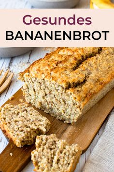 a loaf of banana nut bread sitting on top of a wooden cutting board next to some bananas