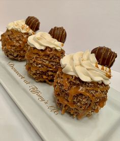 three desserts are sitting on a white plate