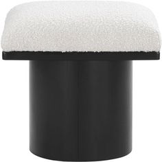 a black and white stool with a cushion on top