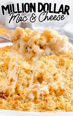 a close up of a casserole dish with cheese being lifted from the casserole