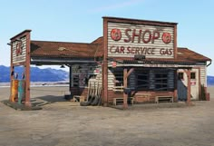 an old gas station sitting in the middle of nowhere