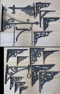 six antique cast iron shelf brackets and brackets, all in different styles / sizes -