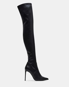 VAVA-voom! A towering stiletto heel, pointed toe and thigh-high shaft make this boot one of the season’s sexiest. Stretch upper to fit most leg sizes Reinforced on top with a silicon strap to ensure no slouching Zipper for ease of getting on and off 4-way stretch patent 4 inch heel height Size 6 measurements: 16.5 inch shaft top circumference, 23.5 inch shaft height Size 8 measurements: 17.25 inch shaft top circumference, 24.5 inch shaft height Size 10 measurements: 18 inch shaft top circumferen Black Paris, Thigh High Heels, Stiletto Heels Boots, Madden Boots, Mob Wife, Steve Madden Store, Leather Socks, Faux Leather Belts, Black Boots Women