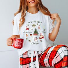 Get into the holiday spirit with our "It's the Most Wonderful Time of the Year" shirt! Perfect for moms and matching family Christmas pajama sets, this festive tee is ideal for Christmas parties, gift exchanges, or cozy nights by the fire. Made from soft, comfortable fabric, it features a cheerful design that captures the joy of the season. Gift it to her or wear it to celebrate the magic of Christmas together with loved ones! Please note that due to the custom nature of each t-shirt, we do not Santa Tshirt, Christmas Pj, Matching Family Christmas Pajamas, Christmas Pajama Set, Family Christmas Pajamas, Christmas Gift For Her, Wonderful Time Of The Year, Christmas T Shirt, Pajama Shirt