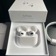 an apple airpods is in its box