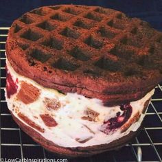 a chocolate waffle cake sitting on top of a cooling rack