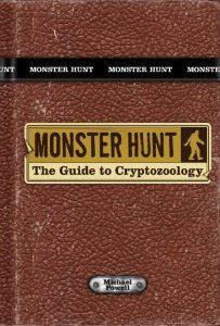 the book cover for monster hunt, which is brown with black trim and gold lettering