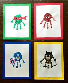 four handprints with different pictures of superheros and spider - man on them