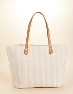 The best party is a beach party and our Fiesta Tote is always ready to come along! Decorated with palmetto embroidery on a cotton and jute blend, this tote features a fun, tiered tassel fob and a faux leather bottom base to keep it dry. The cotton interior features two slip pockets and one hanging zipper pocket. Palm Leaf Beach Tote With Braided Handles, Woven Palm Leaf Beach Bag, Handwoven Palm Leaf Beach Bag, Spartina 449 Handbags, Beach Shoulder Bag With Tassels, Rectangular Shape, Spartina 449, Tassel Fringe, Beach Party, Best Part Of Me