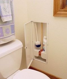 a bathroom with a toilet and sink in it