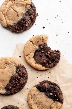 four cookies with chocolate chips on top