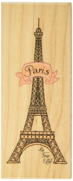 the eiffel tower is engraved on wood