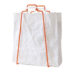 a white paper bag with yellow handles is on a stand against a white background and looks like it could be used as a grocery bag