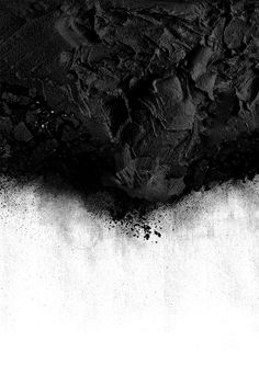 black and white photograph of dirt on the ground