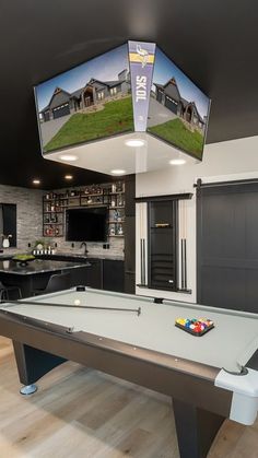 a pool table in the middle of a room