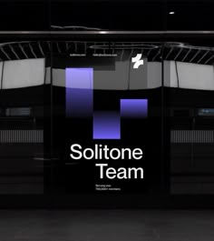 a black and white photo with the words solutione team on it's side