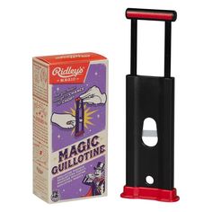 a black and red carton next to a cardboard box for magic guillotting